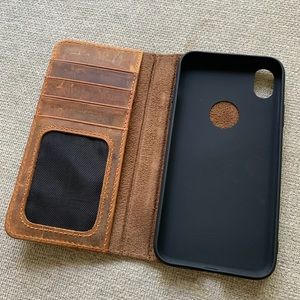 Handmade distressed leather iPhone case.
